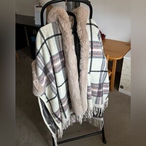 Faux fur lined poncho with fringe